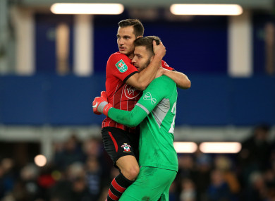 Southampton's Cedric Soares and goalkeeper Angus Gunn celebrate.