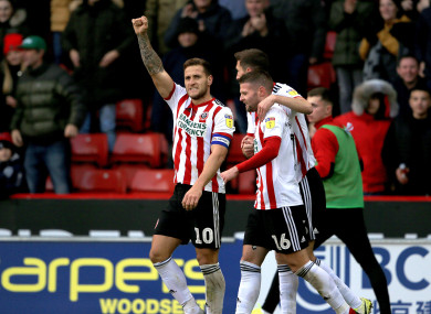 Sheffield United's Billy Sharp (left) celebrates after he scores his sides fourth goal.