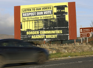 A motorist makes their way North along the old Belfast to Dublin road on the Irish border.