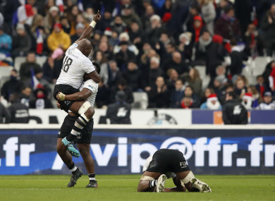 Fiji celebrate a famous win.