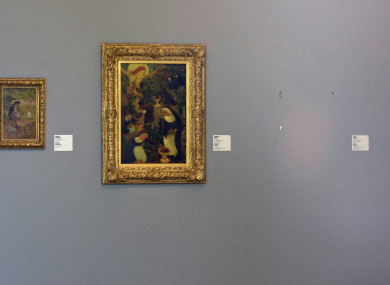 An image from the crime scene showing empty space to the right where paintings hung.