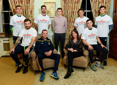 From left: Shane McEntee (Meath), Mickey Burke (Meath), Michael Darragh-Macauley (Dublin), Meath manager Andy McEntee, son of Sean Cox, Jack, wife of Sean Cox, Martina, Eric Lowndes (Dublin), Colm Basquel (Dublin) and Seamus Lavin (Meath).