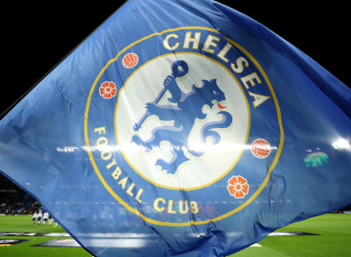 A Chelsea flag is waved at Stamford Bridge