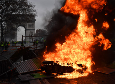 Yellow vests (Gilets jaunes) protest against rising oil prices and living costs on the Champs Elysees in Paris