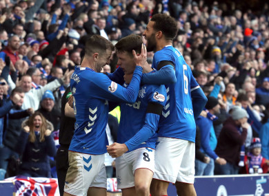 Ryan Jack celebrates with Connor Goldson and Andrew Halliday after scoring for Rangers against Celtic.