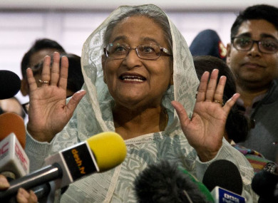Bangladesh Prime Minister Sheikh Hasina speaks to the media after casting her vote in Dhaka yesterday.