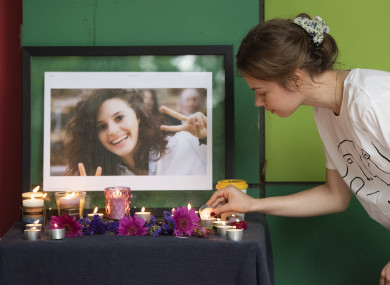 People gather for a vigil in the memory of slain international student Aiia Maasarwe at Latrobe University, Melbourne