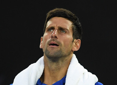 Novak Djokovic of Serbia reacts against Lucas Pouille of France.