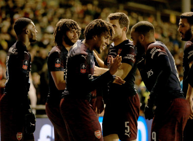 Arsenal's Alex Iwobi celebrates with his team-mates after a goal against Blackpool.