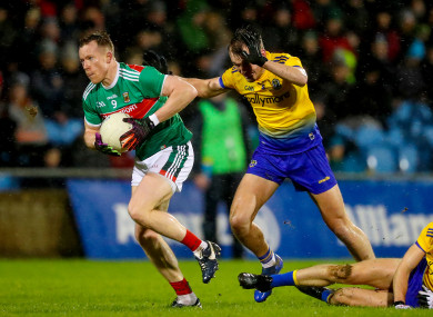 Donal Vaughan sprints by Enda Smith and Tadgh O'Rourke.