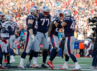 Sony Michel celebrates with James Develin after scoring a touchdown during the second quarter.
