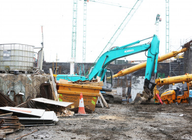 Construction cranes on the building site near the St. James' campus.