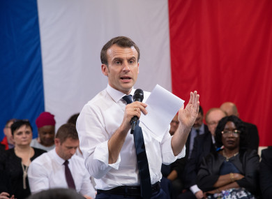 French President Emmanuel Macron attends a meeting with elected officials and local association members as part of the