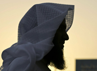 Former Islamic militant, 30-year-old Badr al-Enezi, stands in a courtyard at the Mohammed bin Nayef Center for Advice, Counseling and Care