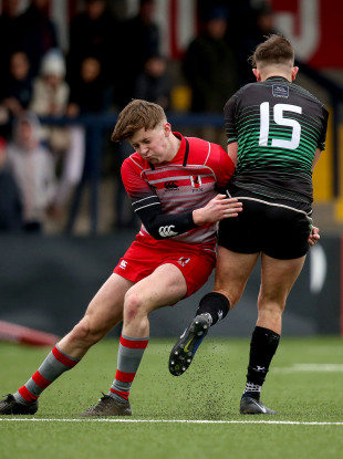 Bandon's Soren Minihane is tackled by William Twomey of Glenstal Abbey at Musgrave Park.