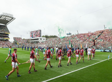 Galway and Limerick players line up before last year's All-Ireland final.