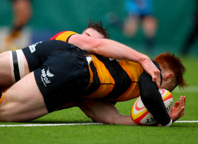 Conor Phillips scores a try for Young Munster.
