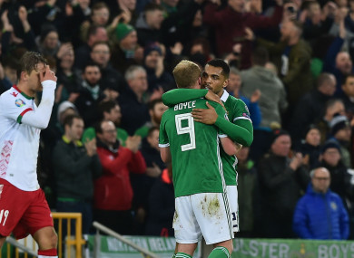 Josh Magennis celebrates with Liam Boyce.