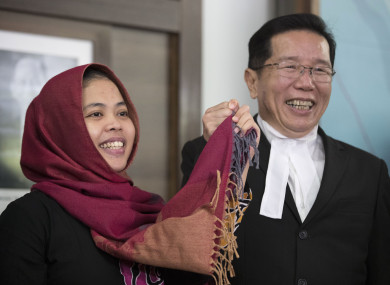Indonesian Siti Aisyah, left, smiles with her lawyer Gooi Soon Seng after a press conference at Indonesian Embassy in Kuala Lumpur, 11 March.