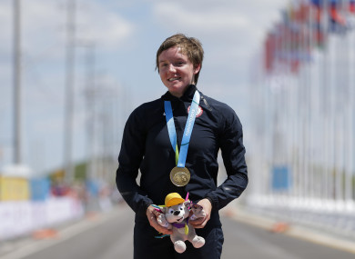 United States gold medalist Kelly Catlin poses after winning the women's individual time trial cycling competition at the Pan Am Games in Milton, Ontario in 2015.