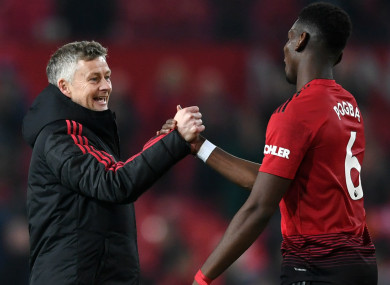 Ole Gunnar Solskjaer with Paul Pogba.