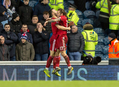 Aberdeen's Connor McLennan celebrates scoring his side's second goal of the game.