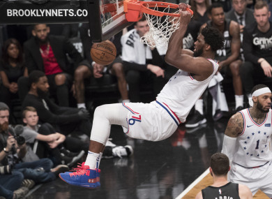 Philadelphia 76ers center Joel Embiid dunks during the second half of Game 4.