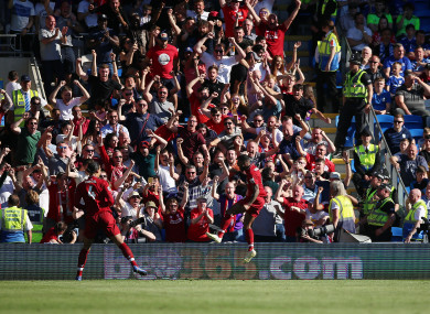 Liverpool's Georginio Wijnaldum celebrates scoring.