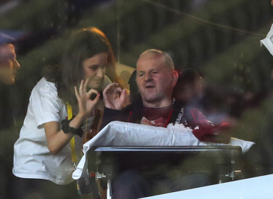 Seán Cox and his wife Martina signal to the crowd ahead of the game.