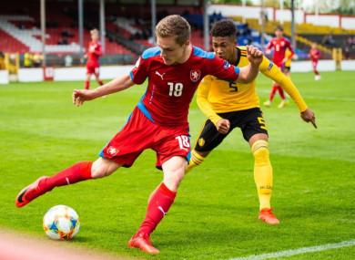 Czech Republic's Josef Koželuh under pressure from Rob Nizet of Belgium.