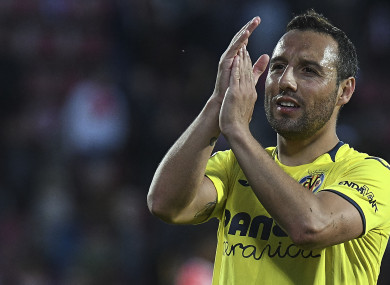 Santi Cazorla applauds supporters during a recent game against Girona.