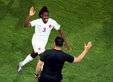 Canada's Kadeisha Buchanan (left) celebrates scoring her side's first goal of the game.