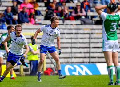 Monaghan's Conor McCarthy celebrates scoring a goal with Jack McCarron.