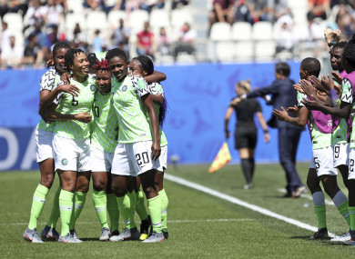 Nigeria players celebrate after taking the lead.
