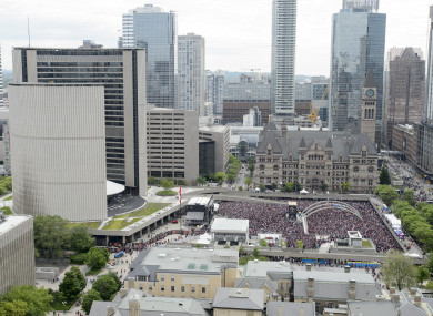 Fans pictured at Nathan Phillips Square at City Hall ahead of the 2019 Toronto Raptors Championship parade in Toronto.