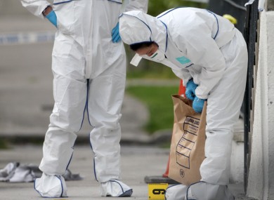 Forensic experts at the scene of the fatal shooting of Real IRA boss Alan Ryan in Clongriffin in Dublin in 2012.
