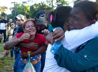 Relatives grieve after dozens of prisoners died.