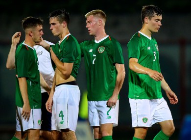 The Irish team react to defeat.