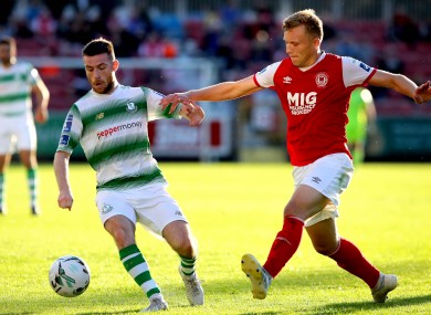 Jack Byrne of Shamrock Rovers under pressure from St Patrick's Athletic's Jamie Lennon during Monday's game between the clubs.