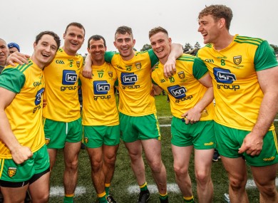 Hugh McFadden (right) celebrates with his Donegal team-mates after the Ulster final.