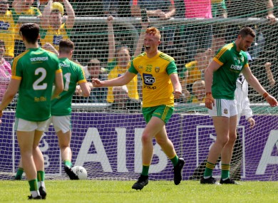Oisin Gallen celebrates his late goal.