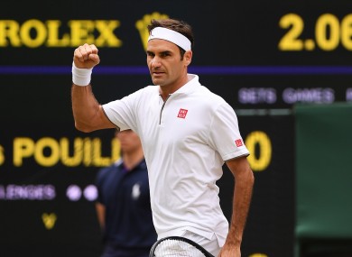Roger Federer celebrates on Centre Court.