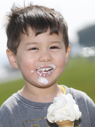 Marc Smith (three) from Dublin enjoying an ice cream on Sandymount Strand in April.
