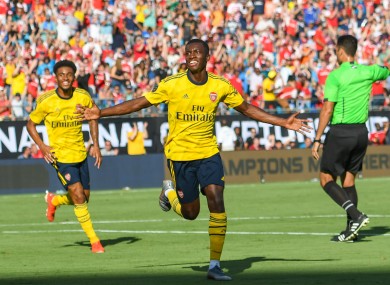 Nketiah celebrates scoring for Arsenal.