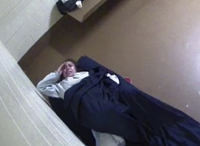 Image from surveillance video released to Killmer, Lane & Newman, LLP law firm by the Denver County Jail shows Diana Sanchez, an inmate about to give birth alone in her Denver jail cell