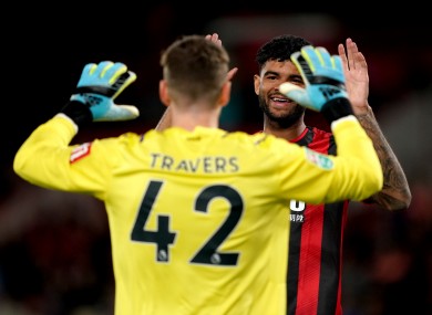 Bournemouth's Philip Billing celebrates their penalty shoot out win with goalkeeper Mark Travers.