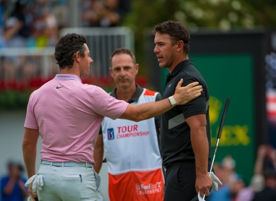 Rory McIlroy and Brooks Koepka after yesterday's Tour Championship in Atlanta.