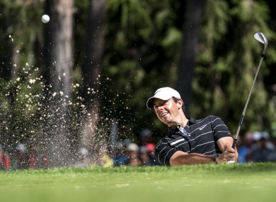 McIlroy plays his way out of the sand yesterday.
