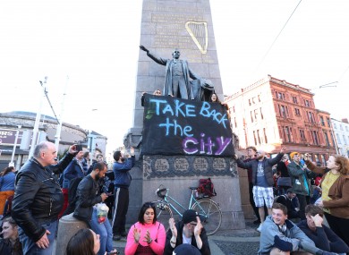 Take Back the City activists protest on Parnell Street in Dublin