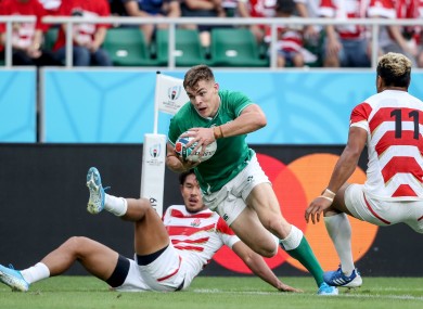 Garry Ringrose gets over the line to score Ireland's first try.